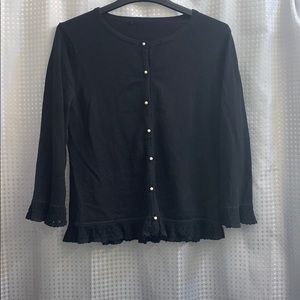 Black sweater! With pearl buttons!